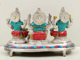 Lakshmi, Ganesha, Saraswati brass statue trio, rear view with raised arms