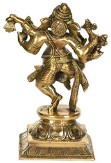 Brass dancing Ganesha sculpture, 9 in, side view with raised arms and ornaments