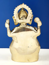 Brass Ganesha statue back view, ornate halo, seated posture, Ashirwad mudra, 7 inch