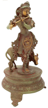 Handmade Venugopala brass idol, green-gold patina, flute held near face, on base