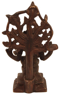 Brass Dakshinamurti Shiva statue in profile, raised arm and ornate cutout backdrop, 6-inch