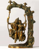 Brass Radha-Krishna swing statue, seated figures holding swing ropes, 18 cm