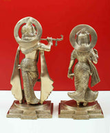 Brass standing Radha and Krishna statues, 15-inch, back/side view with halos and ornate outfits