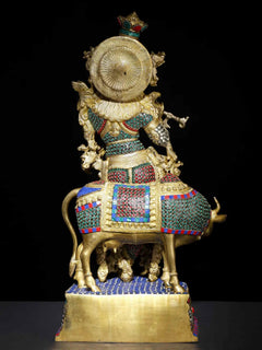 Brass Venugopal Krishna statue on cow, ornate back halo motif with inlay decoration