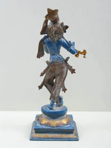Blue brass Lord Krishna statue with flute raised, intricate gold-toned details