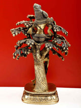 Natural brass Krishna riding figure on ornate tree, beaded details, on circular pedestal base