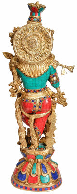 Lord Krishna brass figurine side view, ornate halo and multicolor garments, 24 in