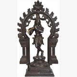 Brass Murali Krishna statue, playing flute, ornate halo with kirtimukha, 13 in