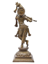 Side view Krishna playing flute brass statue with ornate crown and detailed outfit
