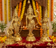 Golden brass Lord Ram darbar statue with four seated/standing figures and archery bow