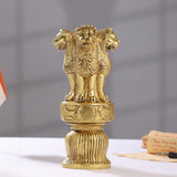 Brass lion capital figurine with three lions and wheel emblem on base, full height