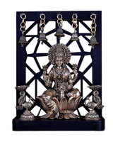 Brass Lakshmi idol with four hanging bell lamps, seated on lotus, 12 in