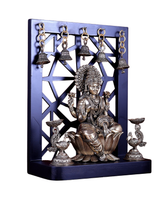 Brass Lakshmi idol with annam-style lamps and bells; four hanging chains