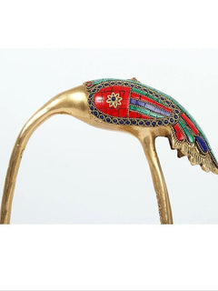 Brass flamingo top detail with red and blue enamel mosaic panel and decorative accents