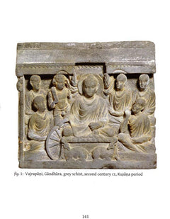 Stone relief panel with seated Buddha, halo, attendants and wheel