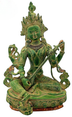 Brass Saraswati idol seated in ornate Nepali style, green patina, 12 inches