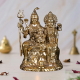 Brass Shiva-Parvati statue with little Ganesha, seated together on a base
