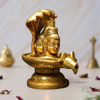 Small brass Shivalinga idol with Sheshnag cobra and seated figure, 4 in