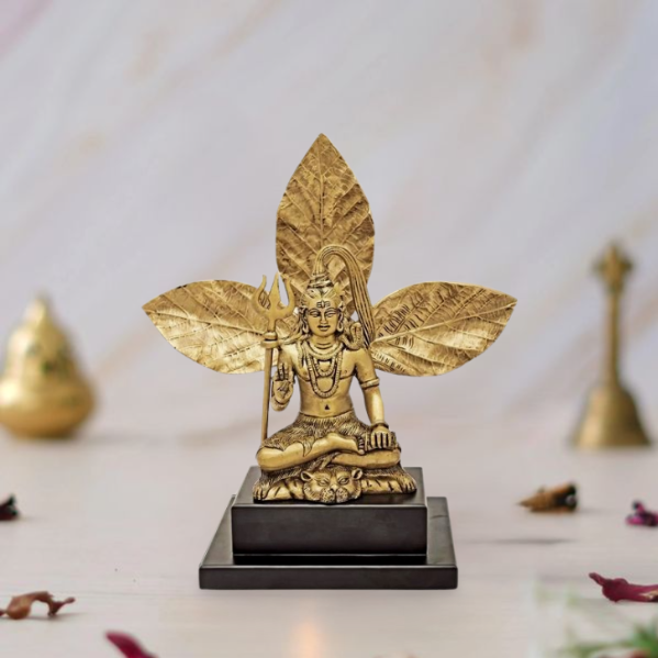 Brass Mahadev Shiva Idol in Ashirwad Mudra Sitting with a Bel/Bilva Leaf Background 11 Inches