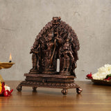 Copper Ram Darbar idol, front view, ornate crown and attendants on pedestal base