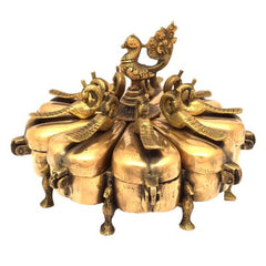 Brass Peacock paan box statue with lids, side view of stacked compartment lids