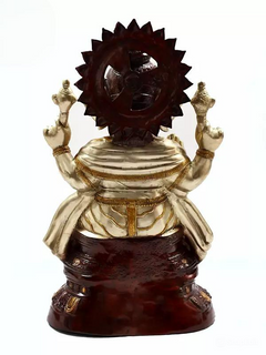 Brass Ganesha sculpture from behind, fan-shaped halo and back adornments