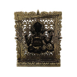 Brass Ganesh panel back with decorative cutout lattice and dark inner backing