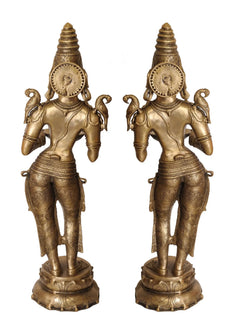 Brass Deepalakshmi pair, back/side view with round halo and winged arm ornamentation