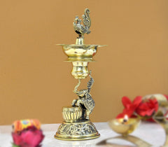 Brass elephant & peacock oil lamp diya with 3 small flames and ornate stem