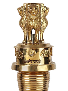 Brass lion emblem finial on a ribbed shaft with engraved golden rings