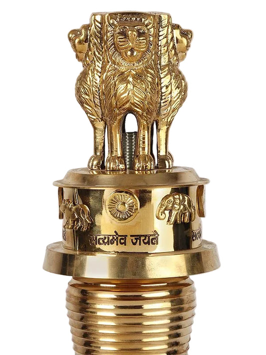 Brass lion emblem finial on a ribbed shaft with engraved golden rings