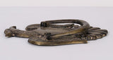 Side view of antiqued brass eagle door knocker with ring handle