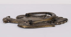 Side view of antiqued brass eagle door knocker with ring handle