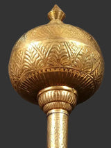 Decorative brass gada with detailed engraved spherical head and ribbed base, home temple