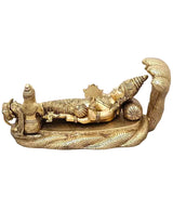 Brass Vishnu Sheshshayi idol, reclining with detailed ornaments and cobra hood above