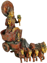 Brass Surya statue side angle, seated deity with crown, holding lamp over horse team