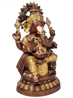 Brass Ganesha statue in three-quarter view, gold accents, detailed crown and ornaments