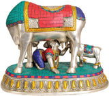 Brass Krishna drinking milk idol with cow pair and small calf, teal base