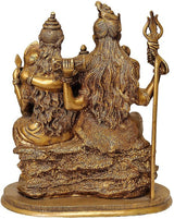 Brass Shiva Parivaar figurine side view, long-haired deity holding trident, 11-inch