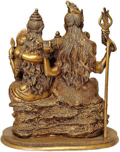 Brass Shiva Parivaar figurine side view, long-haired deity holding trident, 11-inch