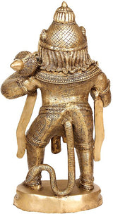 Brass Hanuman idol from behind, carved torso details, long tail-like form