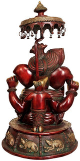 Brass Lord Ganesha idol with umbrella canopy, red body, seated posture, detailed base