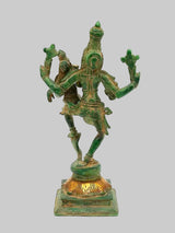 Brass multi-armed deity sculpture with green patina and gold accents, rear 3/4 view