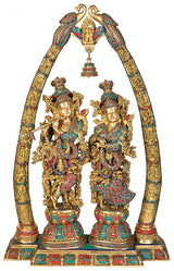 Brass Radha Krishna murti on arch frame, colorful enamel-style detailing, 44 in