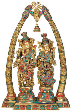 Brass Radha Krishna murti on arch frame, colorful enamel-style detailing, 44 in