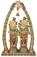 Brass Radha Krishna arch murti, two standing figures with ornate crowns, 44 in
