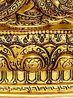 Buddha brass statue pedestal with engraved circular motifs and border details