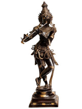 Handmade brass Krishna flute-playing statue in dark brown and gold finish, full figure