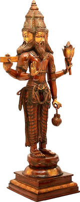 Large brass Lord Brahma statue, side view with crown and striped robe, holding lamp