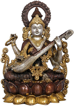 Handmade Saraswati brass statue, seated with veena and ornate halo on lotus base